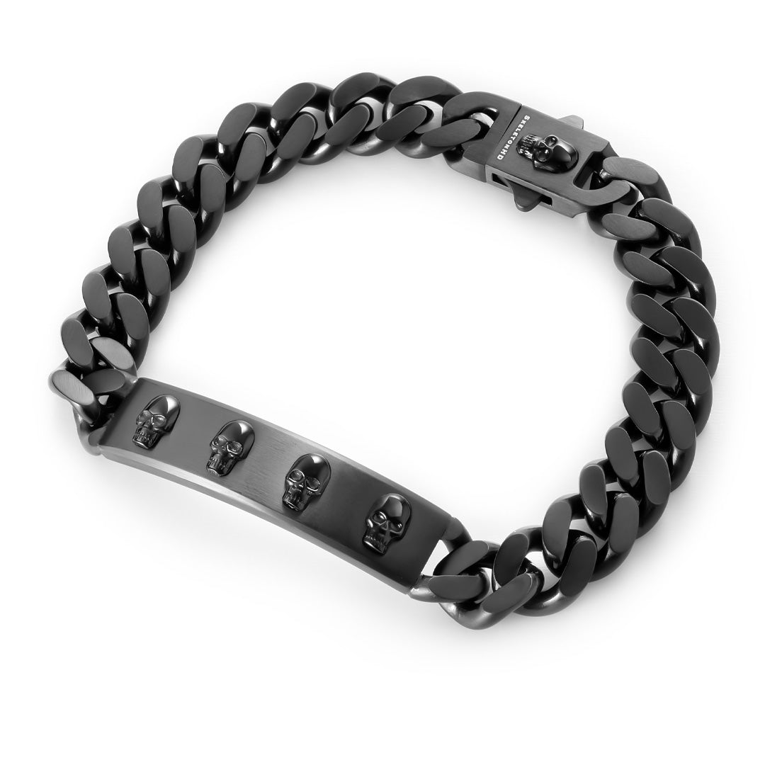 Black chain bracelet with skull designs on a white background